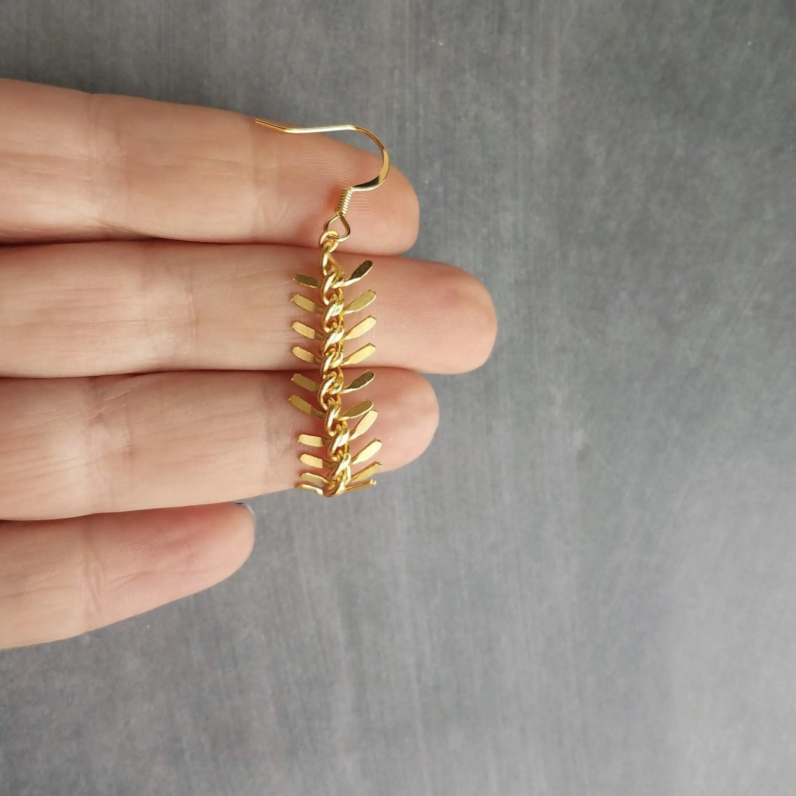 Gold Arrow Earrings, modern earring, chevron earring, fishbone earring, spine earring, vertebrae earring, feather earring, long gold dangle